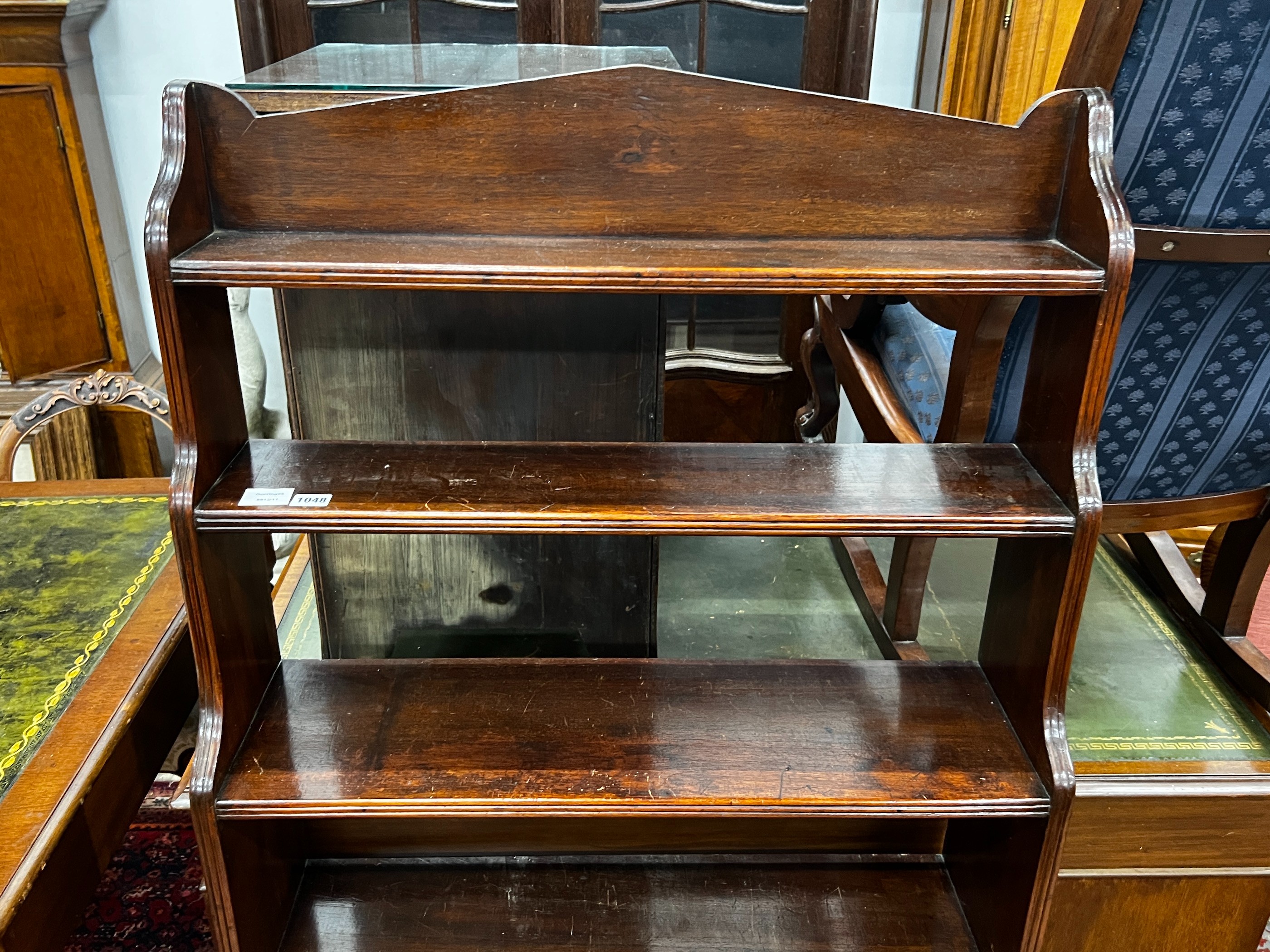 A 19th century mahogany graduated open bookcase, length 82cm, depth 31cm, height 152cm